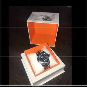 Like new ESQ by Movado blue rotating dial watch